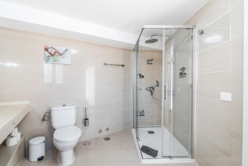 Et badeværelse på Moser Living Premium Apartments - Puerto Rico