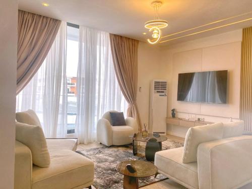 Una televisión o centro de entretenimiento en Elysian Villa