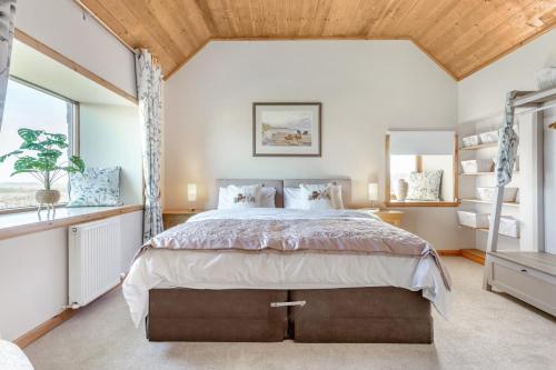 Ένα ή περισσότερα κρεβάτια σε δωμάτιο στο 1 Bed in Wick oc-b33442