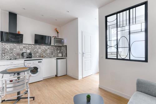 Køkken eller tekøkken på Cosy Studio Cité Pilleux