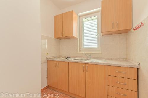 Kuchyň nebo kuchyňský kout v ubytování Miljenko