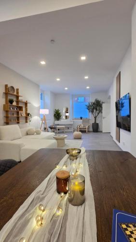 TV a/nebo společenská místnost v ubytování Boutique-Apartments