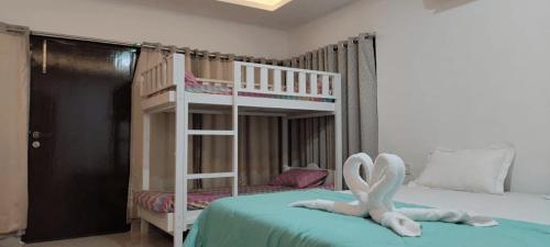 Postel nebo postele na pokoji v ubytování Teplong - The Paix, Kaziranga