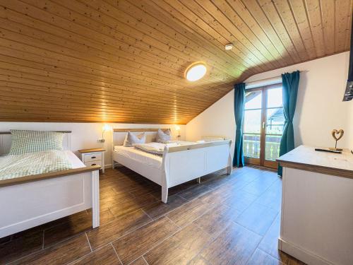 Postel nebo postele na pokoji v ubytování Landhaus Steibis - Hochgrat