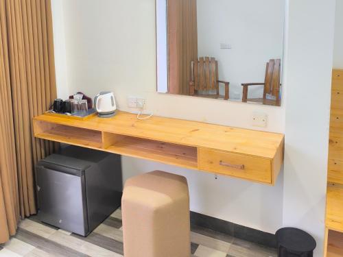 Η κουζίνα ή μικρή κουζίνα στο Legacy Inn Ella