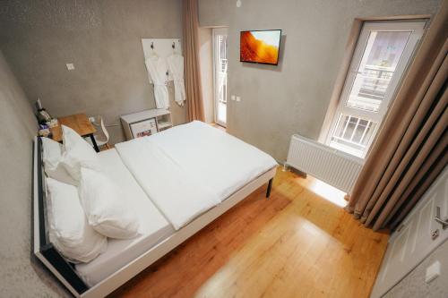 Een bed of bedden in een kamer bij ИксаОтель