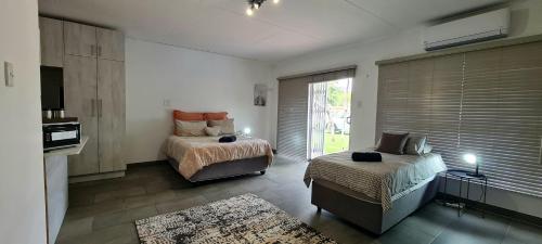 Postel nebo postele na pokoji v ubytování Tenuta Overnight Suite