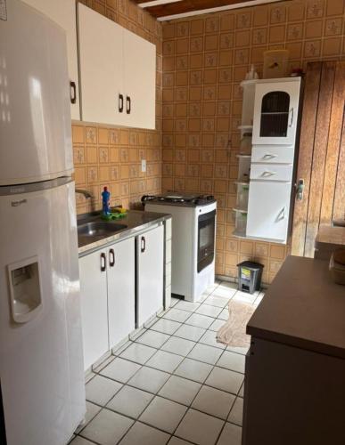 Η κουζίνα ή μικρή κουζίνα στο Casa Pé na Areia em Paripueira