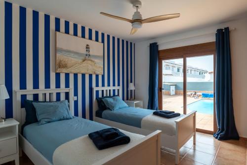 Katil atau katil-katil dalam bilik di Villa Skawi