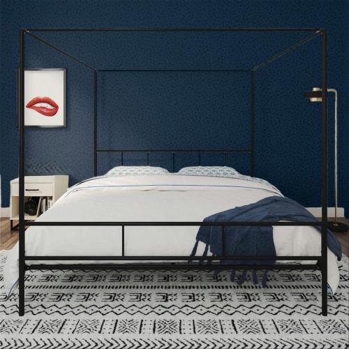 a bedroom with a bed with a blue wall at The Basquiat Suite in East Orange