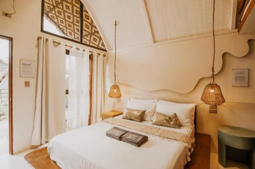 Postel nebo postele na pokoji v ubytování Luna and Sol Beach Resort