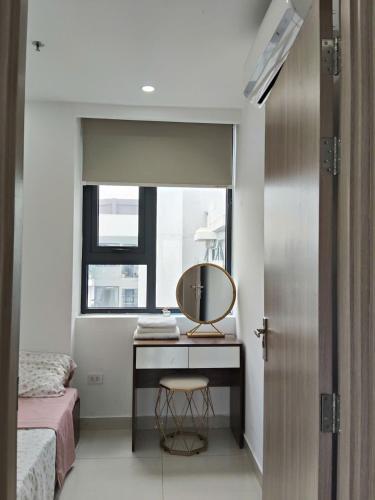 Ένα ή περισσότερα κρεβάτια σε δωμάτιο στο Homestay Nera Graden Hue - Nghỉ dưỡng cao cấp Huế