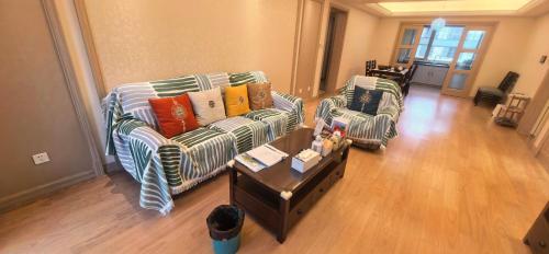 En eller flere senge i et værelse på Tidewhisper Deluxe Suite 1 -2 Bedrooms, 2 Bathrooms