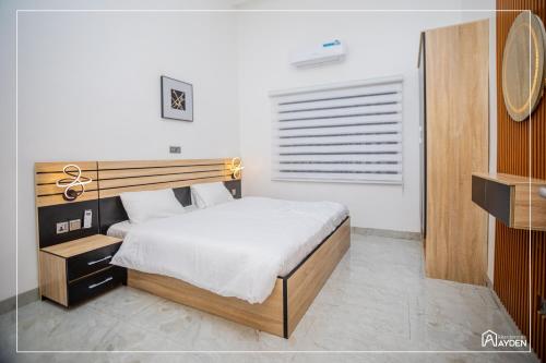 Ένα ή περισσότερα κρεβάτια σε δωμάτιο στο Résidence Ayden