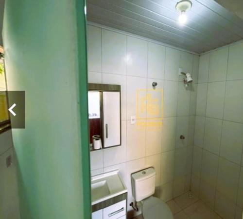 Et badeværelse på Casa Espaçosa e Confortável