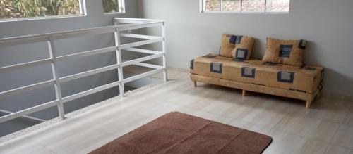 Et opholdsområde på Casa Espaçosa e Confortável