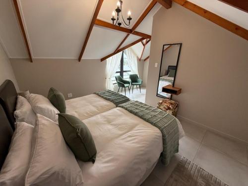 Postel nebo postele na pokoji v ubytování Pure Clarens