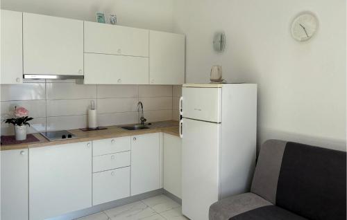 Gorgeous Apartment In Podgora With House Sea View