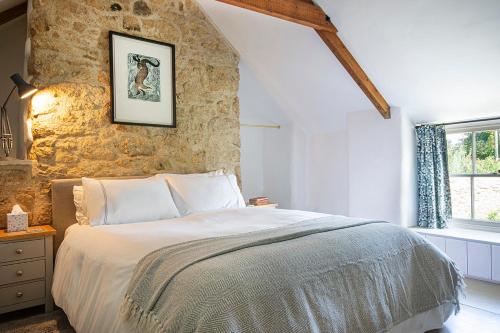 Voodi või voodid majutusasutuse Manor Cottage at Cusgarne Manor adults only toas