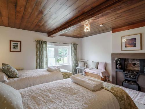 Ένα ή περισσότερα κρεβάτια σε δωμάτιο στο 2 Bed in Croglin 83330