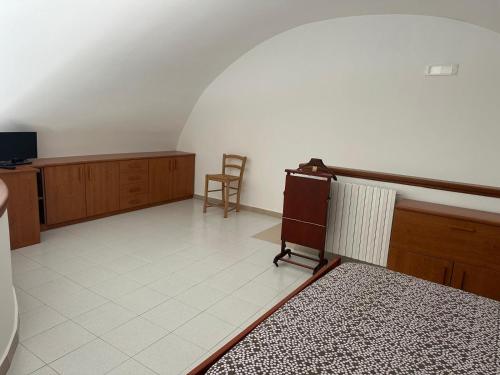 Ένα ή περισσότερα κρεβάτια σε δωμάτιο στο Nonno Gian