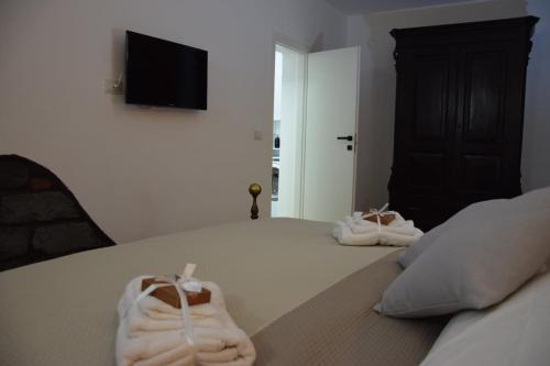 Postel nebo postele na pokoji v ubytování Papà Vulcano - Oasi di Pietra