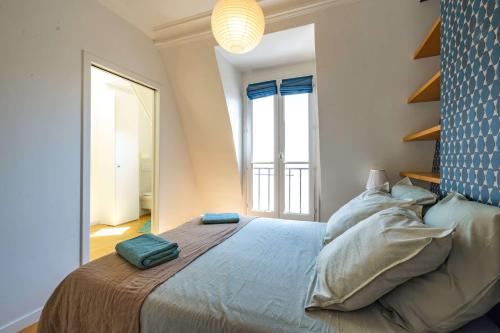 Posteľ alebo postele v izbe v ubytovaní 6 Guest Flat - Martyrs