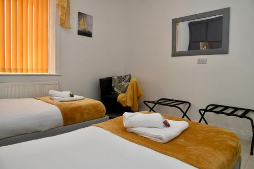 Ένα ή περισσότερα κρεβάτια σε δωμάτιο στο The Lower Deck