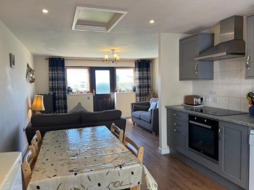 Køkken eller tekøkken på Roan Cottage