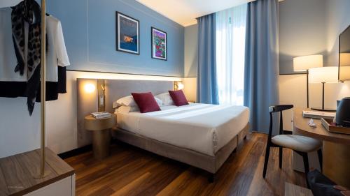 Postel nebo postele na pokoji v ubytování Hotel Canada