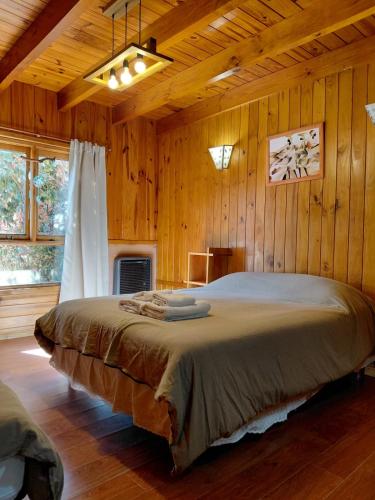 Llit o llits en una habitació de Departamentos Sonne