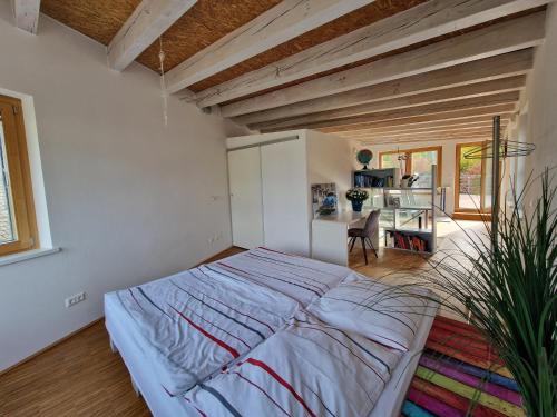 Postel nebo postele na pokoji v ubytování Höhenblick Klosterneuburg