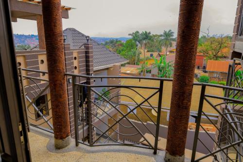 a balcony with a view of a city at Luxury Gem in Nsambya 1km from American Embassy in Kampala