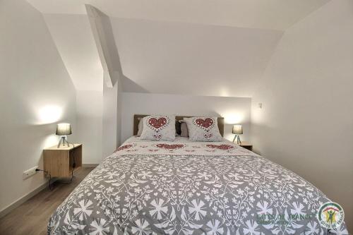 En eller flere senge i et værelse på Pres des nouelles