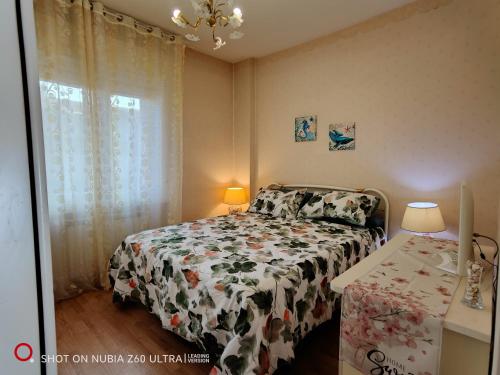 Giường trong phòng chung tại Atlantis Apartment Trieste