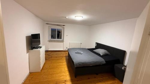 Ένα ή περισσότερα κρεβάτια σε δωμάτιο στο Wohnung für bis zu 6 Personen in 84375 Kirchdorf