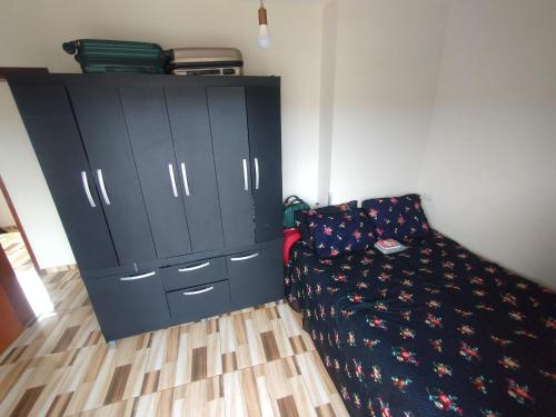 Postel nebo postele na pokoji v ubytování Casa com piscina próximo à praia