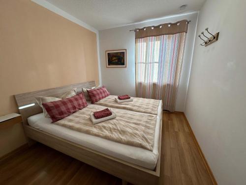 Ένα ή περισσότερα κρεβάτια σε δωμάτιο στο ChiemseeStrand