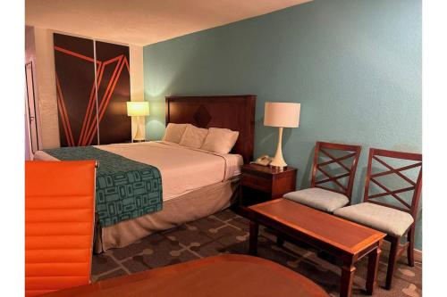 Postel nebo postele na pokoji v ubytování Moonlight Inn Hotel O Hattiesburg, MS