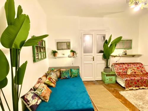 Ένα ή περισσότερα κρεβάτια σε δωμάτιο στο Muzeum Butique Studio