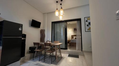 TV a/nebo společenská místnost v ubytování Puspa Private Guest House