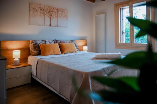 Postel nebo postele na pokoji v ubytování Jungle Veranda con Ristorante,Vicenza e Padova