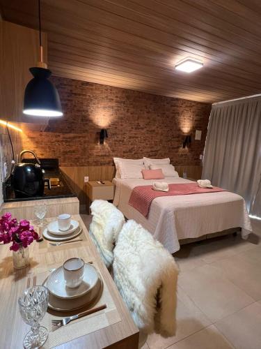 Postel nebo postele na pokoji v ubytování Serra Chalés