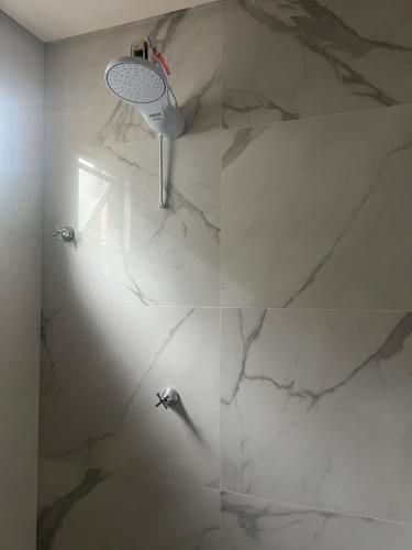 Ένα μπάνιο στο Residencial da Ju - Apt 03