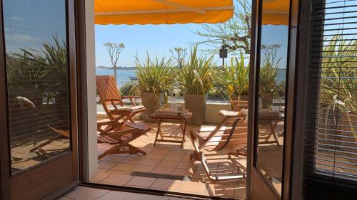 ARCACHON APPARTEMENT FACE PLAGE 5 pers Wi-Fi Parking Linge de maison gratuit 1chambre parentale 1cabine lits superposés 1 canapé lit