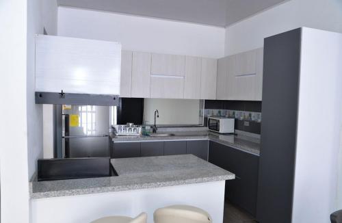 Η κουζίνα ή μικρή κουζίνα στο Casa Completa con parqueadero privado capacidad de hasta 8 personas