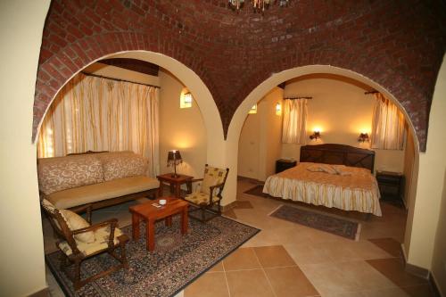 Postel nebo postele na pokoji v ubytování Siwa Safari Paradise Hotel