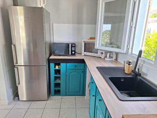 Køkken eller tekøkken på La villa larimar