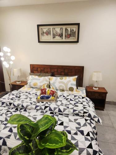 Ένα ή περισσότερα κρεβάτια σε δωμάτιο στο Aura Murree