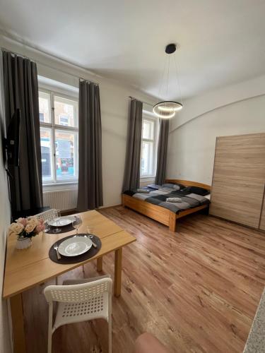 Ένα ή περισσότερα κρεβάτια σε δωμάτιο στο MIVA apartments